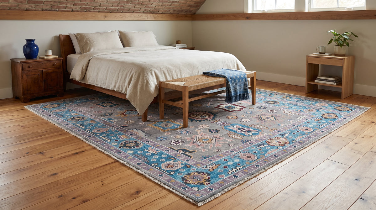 Rhea Exquisite Gray Hand Knotted Wool Rug in a bedroom