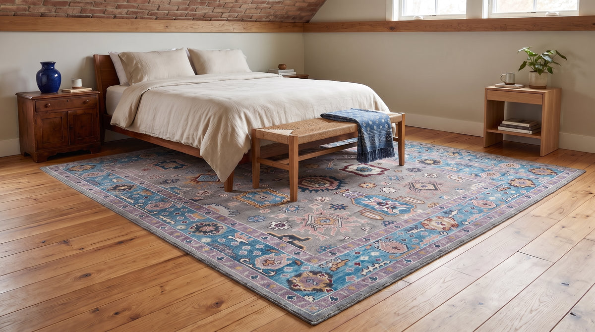Rhea Exquisite Gray Hand Knotted Wool Rug in a bedroom