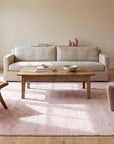 Rhea Moroccan Pink Hand Knotted Wool Rug in a living room
