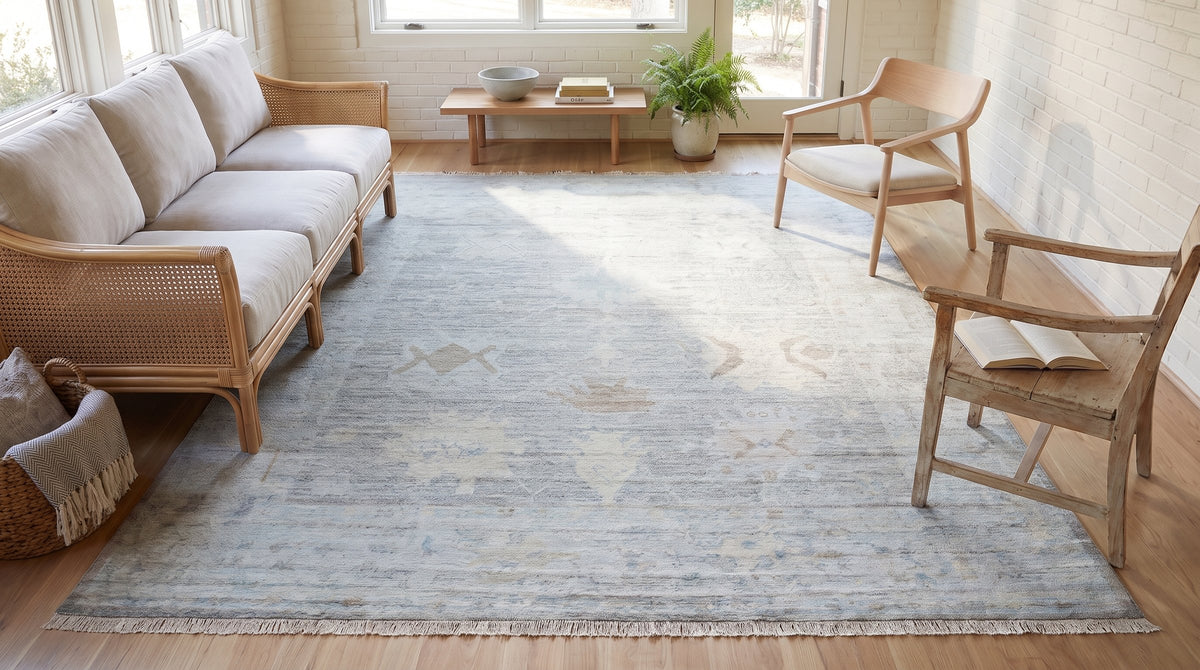 Ruby Fiona Ivory Hand Knotted Silk Rug in a sunroom