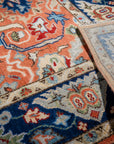 Rust Oushak rug back and navy border detail