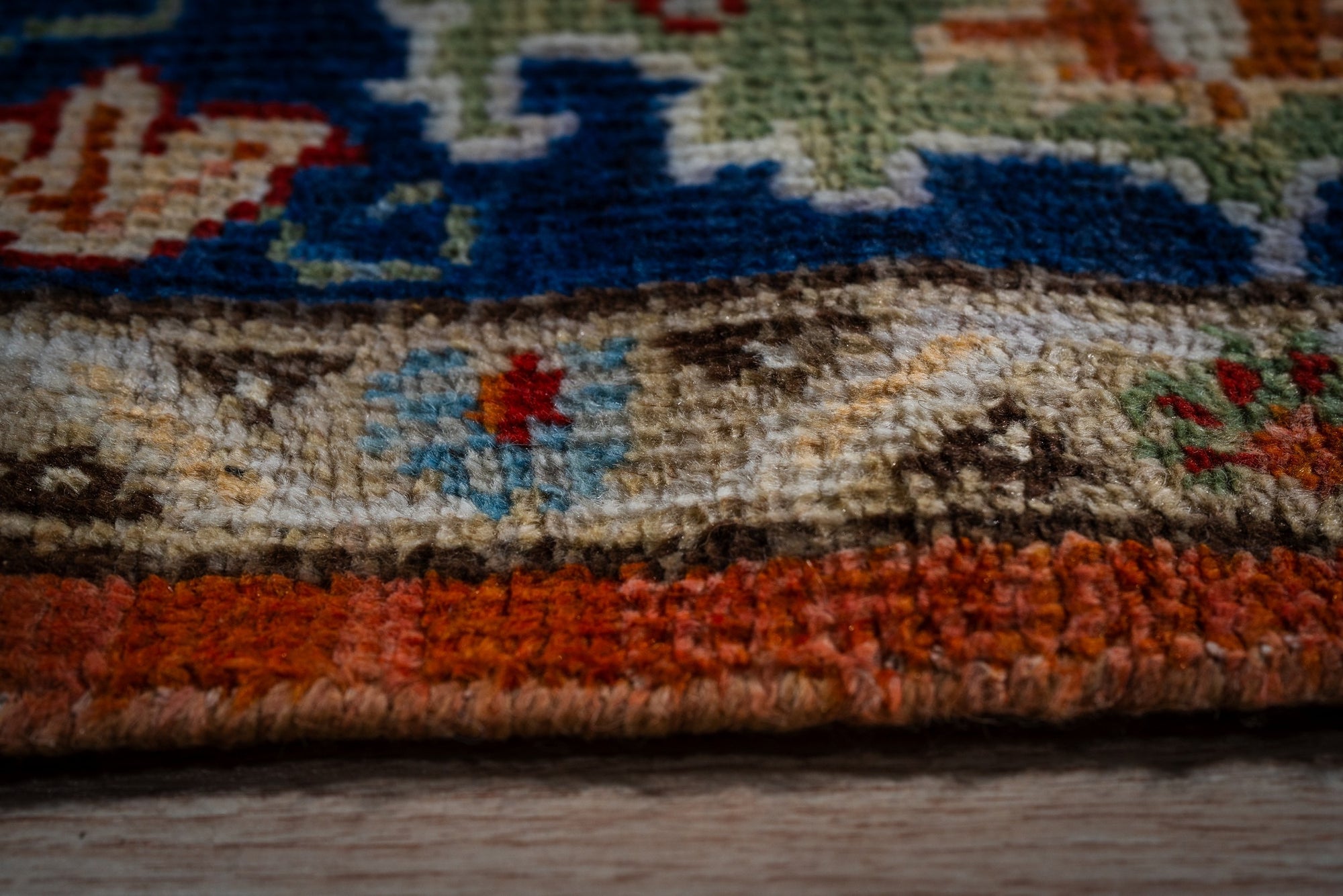 Rust Oushak rug edge and pile detail