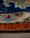 Rust Oushak rug edge and pile detail