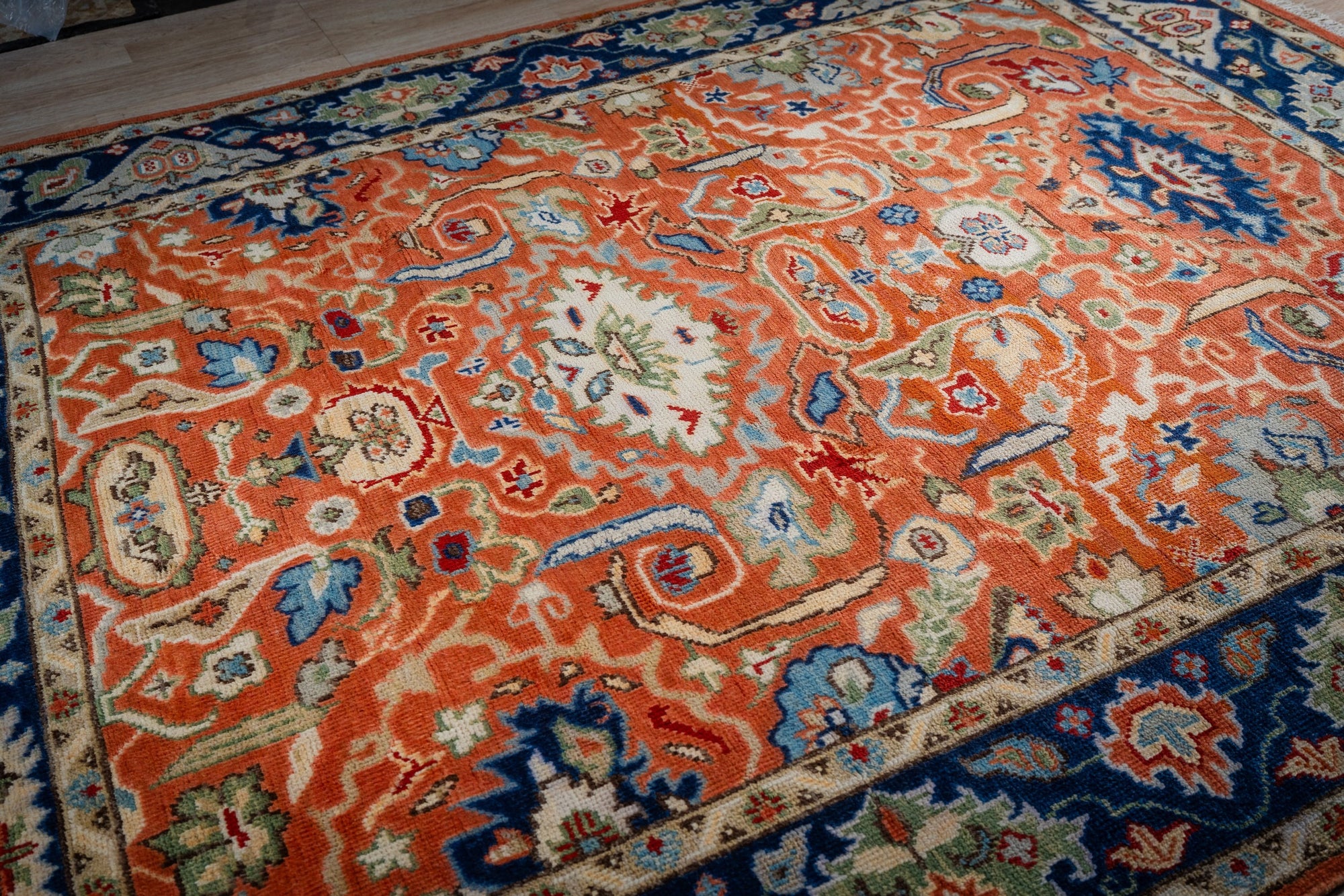 Rust Oushak rug allover floral field detail
