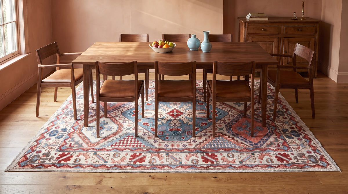 Rustic Isla Gray Hand Knotted Wool Rug in a dining room