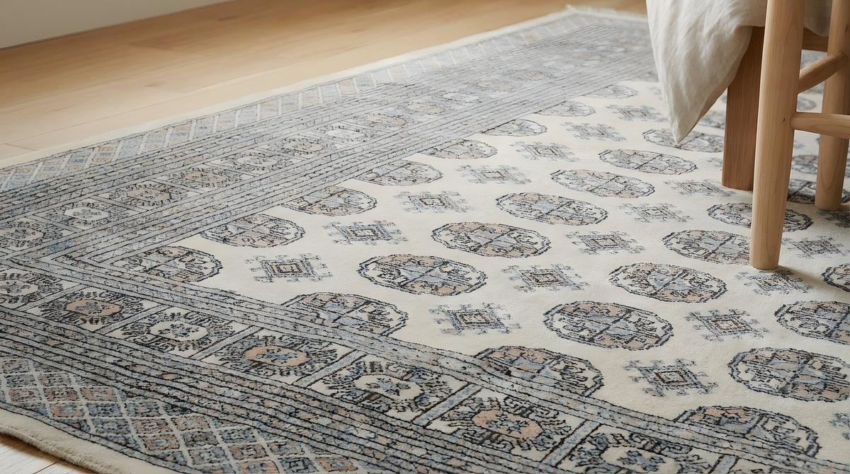 Rustic Nina Beige Hand Knotted Wool Rug in a bedroom