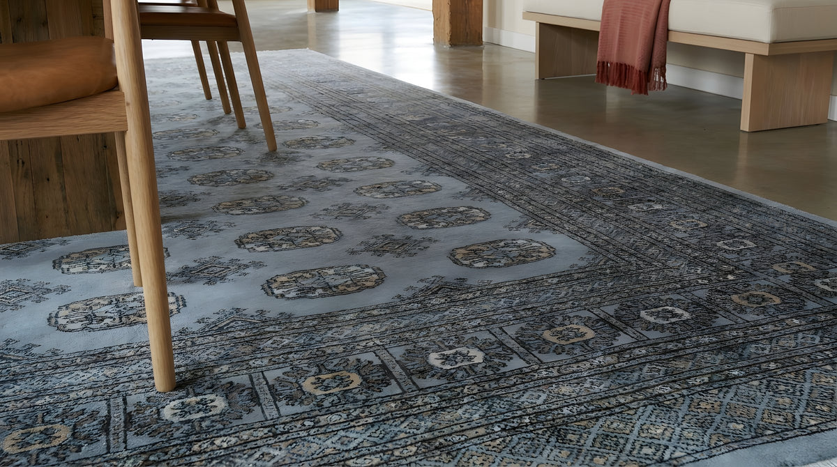 Rustic Nina Gray Hand Knotted Wool Rug in a dining room