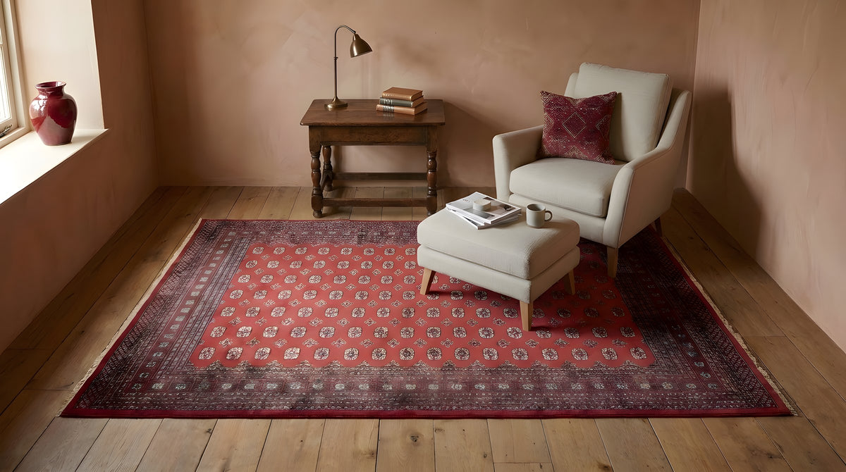 Rustic Nina Red Hand Knotted Wool Rug in a reading nook