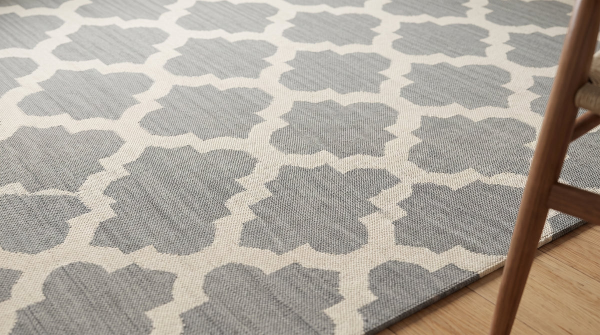 Selene Elena Gray Flatweave Wool Rug in a dining room
