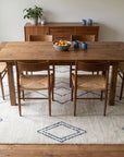 Selene Moroccan Ivory Hand Knotted Wool Rug in a dining room