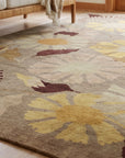 Serene Timeless Brown Hand Knotted Wool Rug in a sunroom