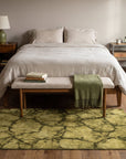 Sleek Cozy Green Hand Knotted Wool Rug in a bedroom