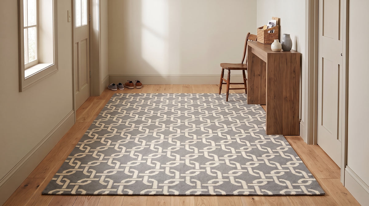 Sloane Cozy Grey Flatweave Wool Rug in a hallway