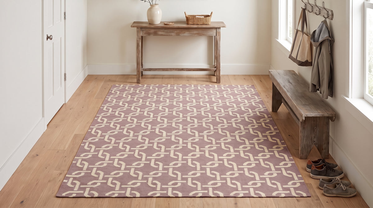 Sloane Cozy Pink Flatweave Wool Rug in a entryway