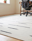 Sloane Majestic Gray and Ivory Flatweave Wool Rug in a home office