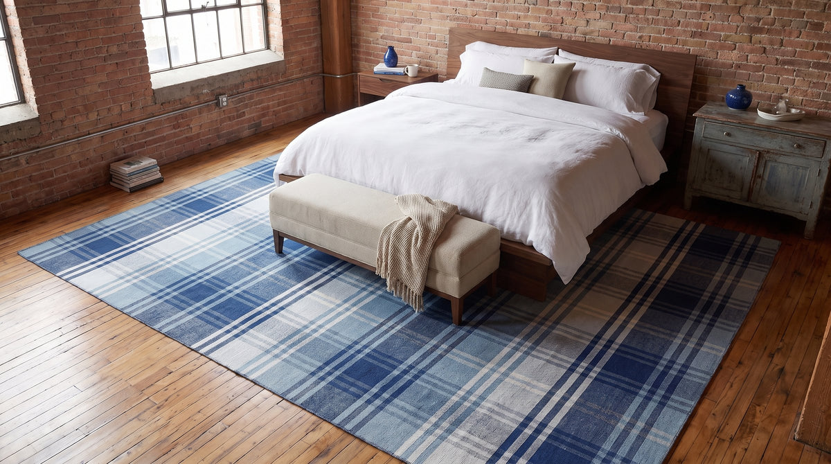 Sophisticated Elegant Blue Flatweave Wool Rug in a bedroom