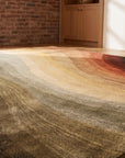 Stylish Sloane Multicolor Hand Tufted Wool Rug in a dining room