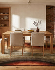 Stylish Sloane Multicolor Hand Tufted Wool Rug in a dining room