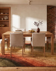 Stylish Sloane Multicolor Hand Tufted Wool Rug in a dining room
