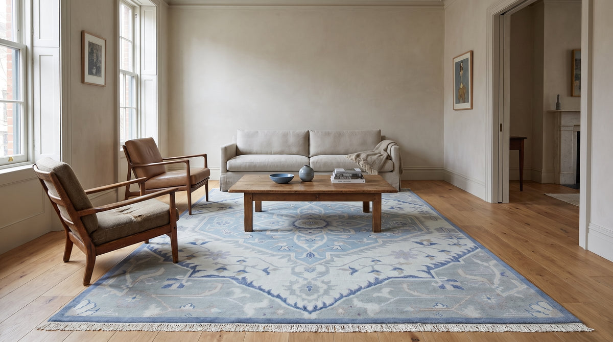 Stylish Trendy Ivory Hand Knotted Wool Rug in a living room
