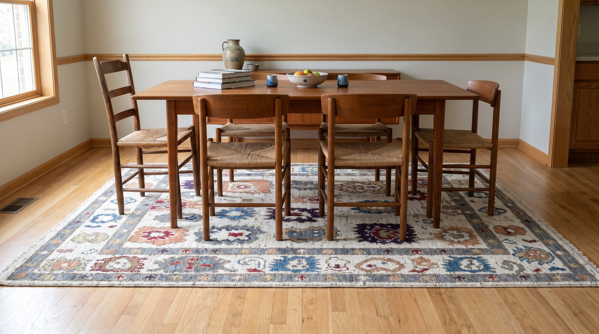Sumptuous Fiona Ivory Hand Knotted Wool Rug in a dining room