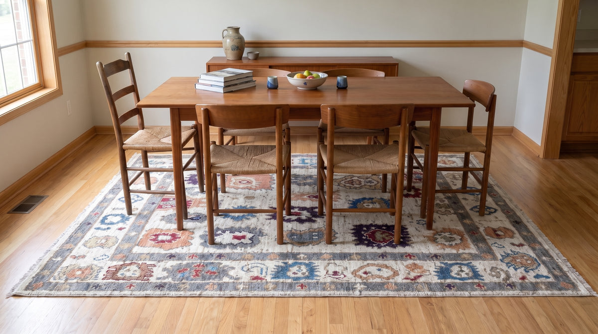 Sumptuous Fiona Ivory Hand Knotted Wool Rug in a dining room