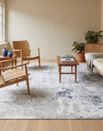 Sumptuous Lila Beige and Gray Machine Made Wool Rug in a sunroom