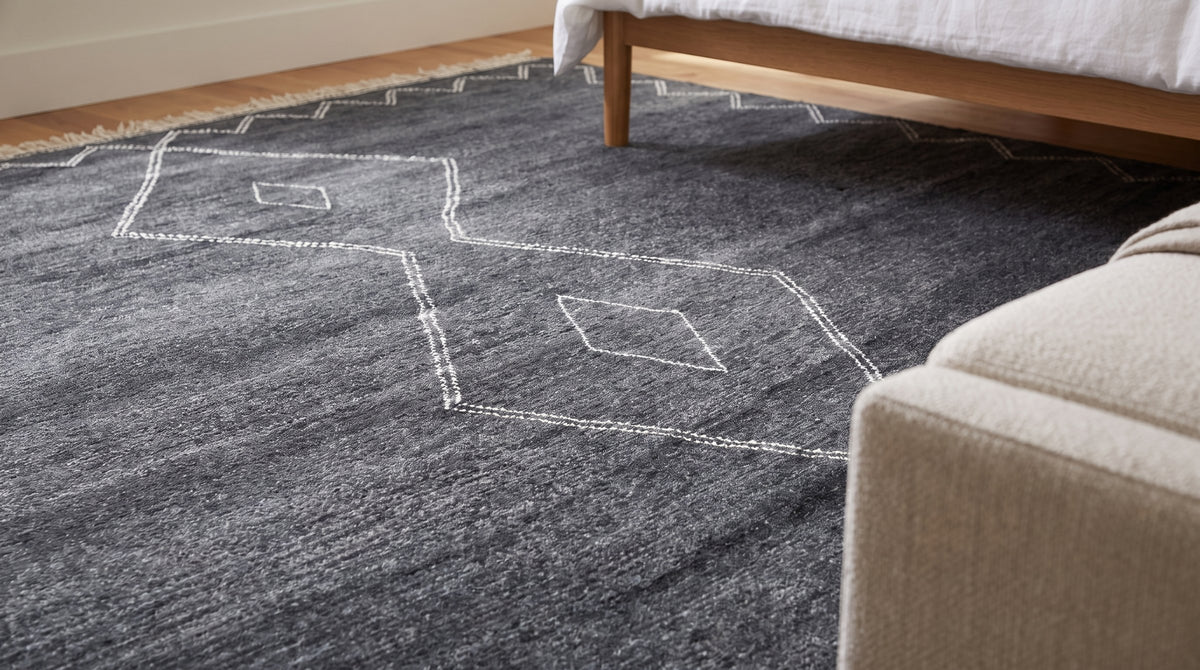 Talia Moroccan Charcoal Hand Knotted Wool Rug in a bedroom