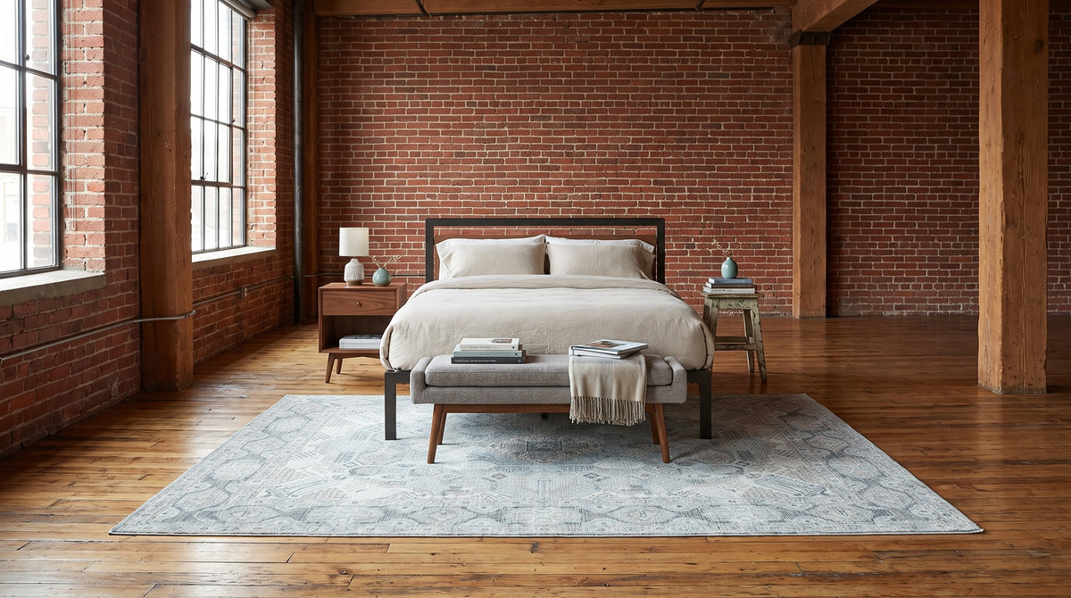 Tessa Bespoke Green Handmade Wool Rug in a bedroom