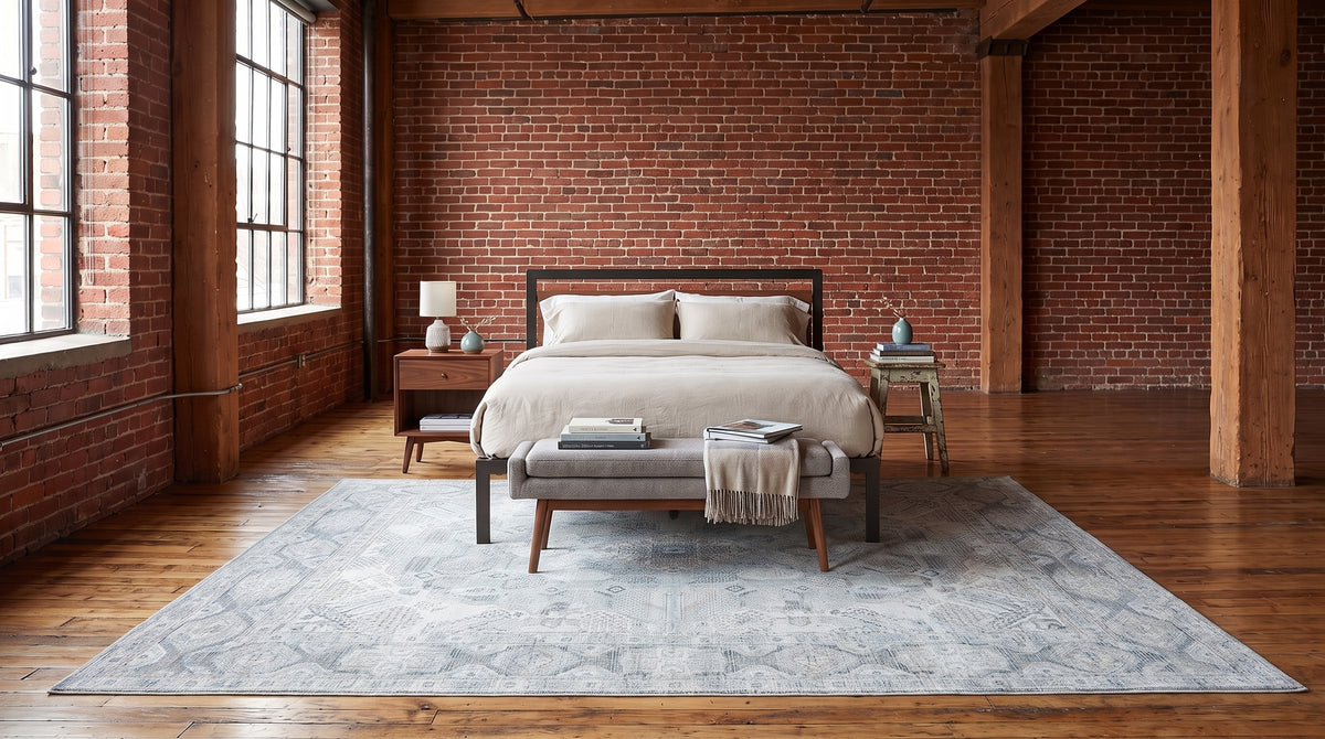 Tessa Bespoke Green Handmade Wool Rug in a bedroom
