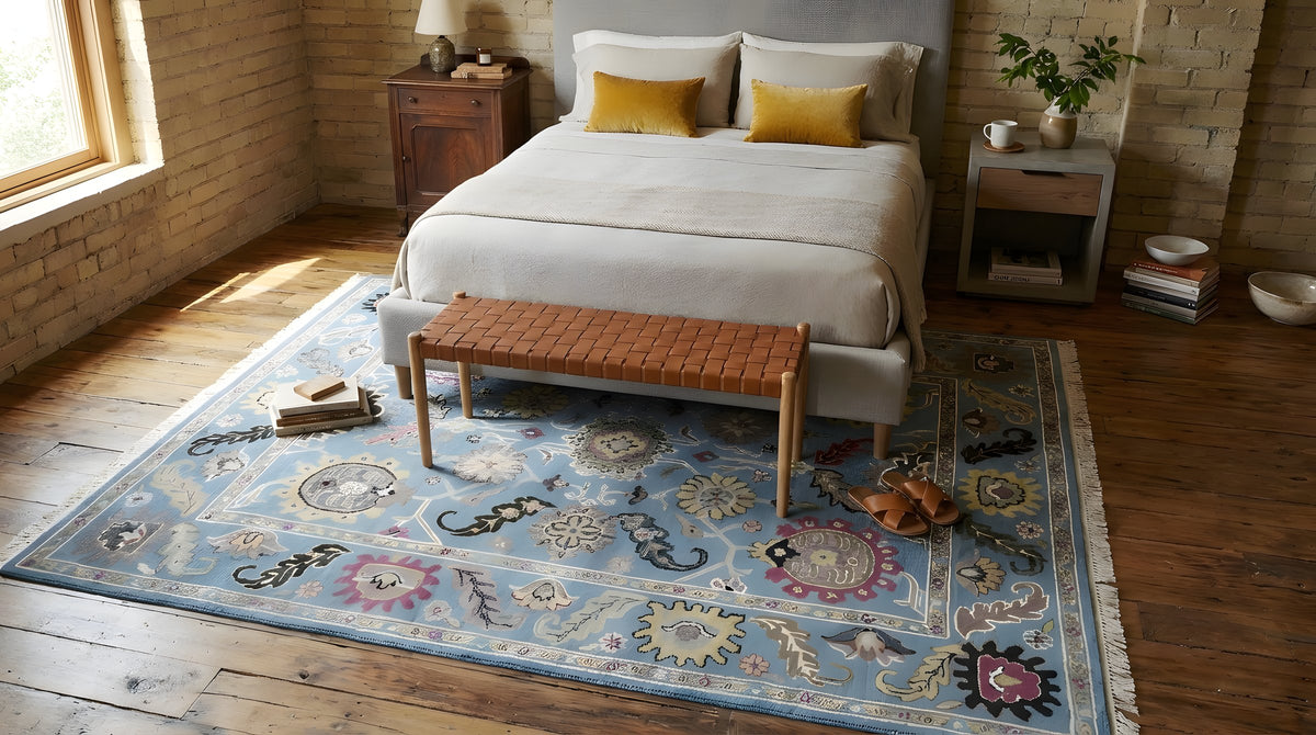 Tessa Laine Blue Hand Knotted Wool Rug in a bedroom