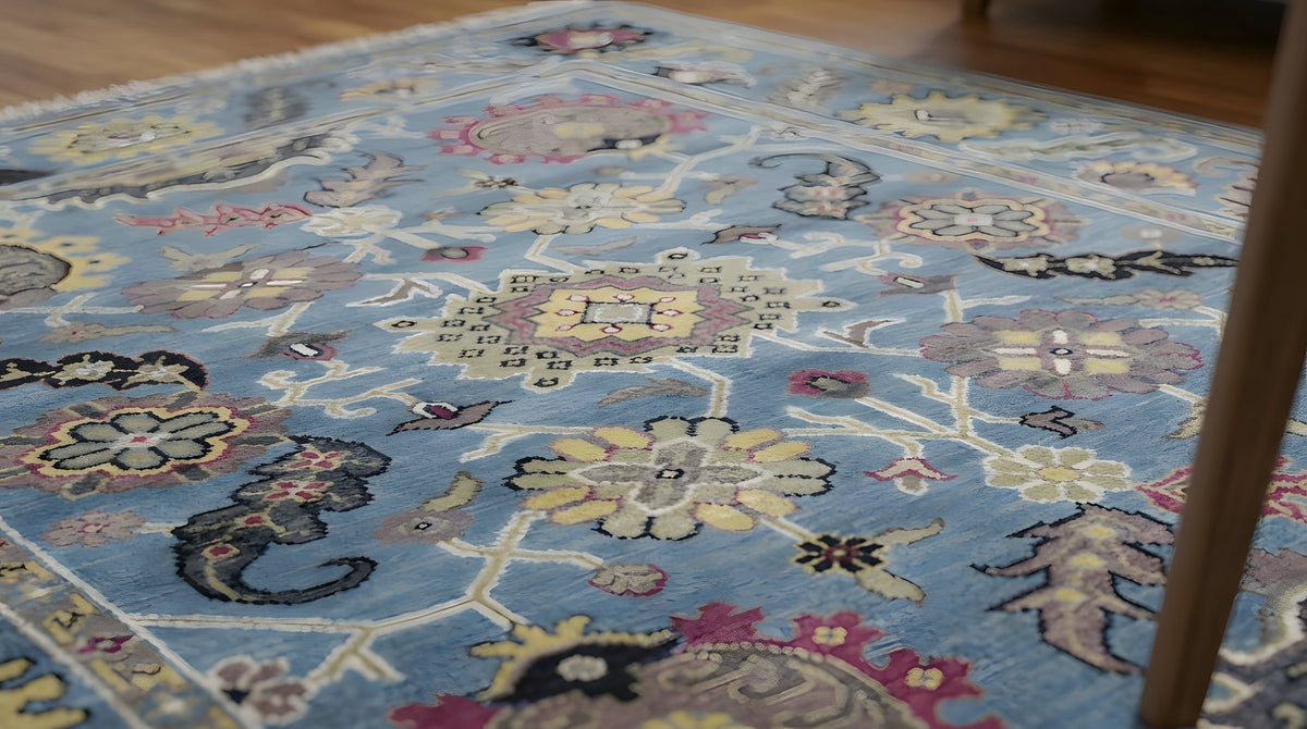 Tessa Laine Blue Hand Knotted Wool Rug in a dining room