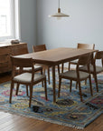 Tessa Laine Blue Hand Knotted Wool Rug in a dining room