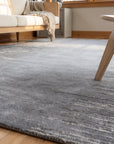 Tessa Maya Gray Hand Knotted Wool Rug in a sunroom