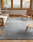 Tessa Maya Gray Hand Knotted Wool Rug in a sunroom
