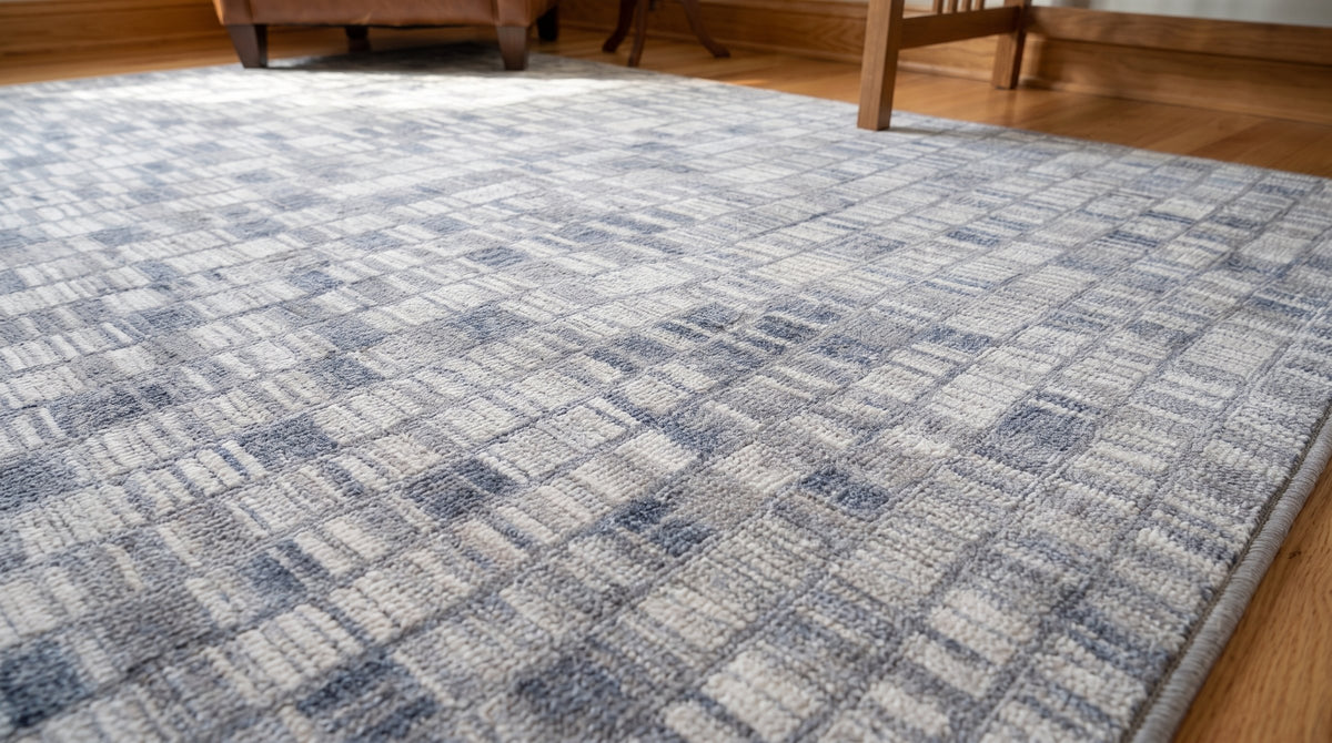 Tessa Sophisticated Gray Hand Knotted Wool Rug in a home office
