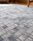Tessa Sophisticated Gray Hand Knotted Wool Rug in a home office