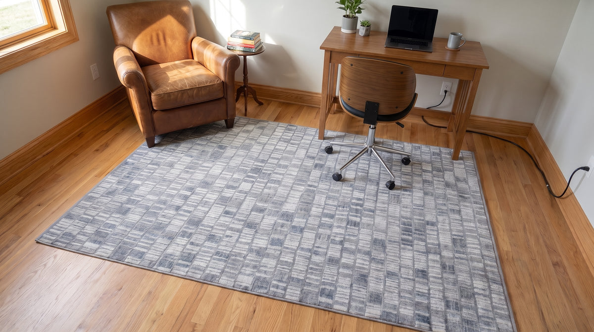 Tessa Sophisticated Gray Hand Knotted Wool Rug in a home office
