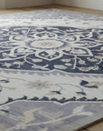 Timeless Oriental Ivory and Gray Hand Knotted Wool Rug in a living room