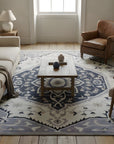 Timeless Oriental Ivory and Gray Hand Knotted Wool Rug in a living room