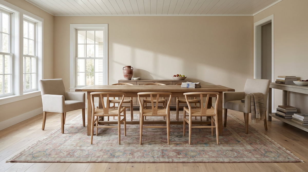 Timeless Oushak Pink Hand Knotted Wool Rug in a dining room