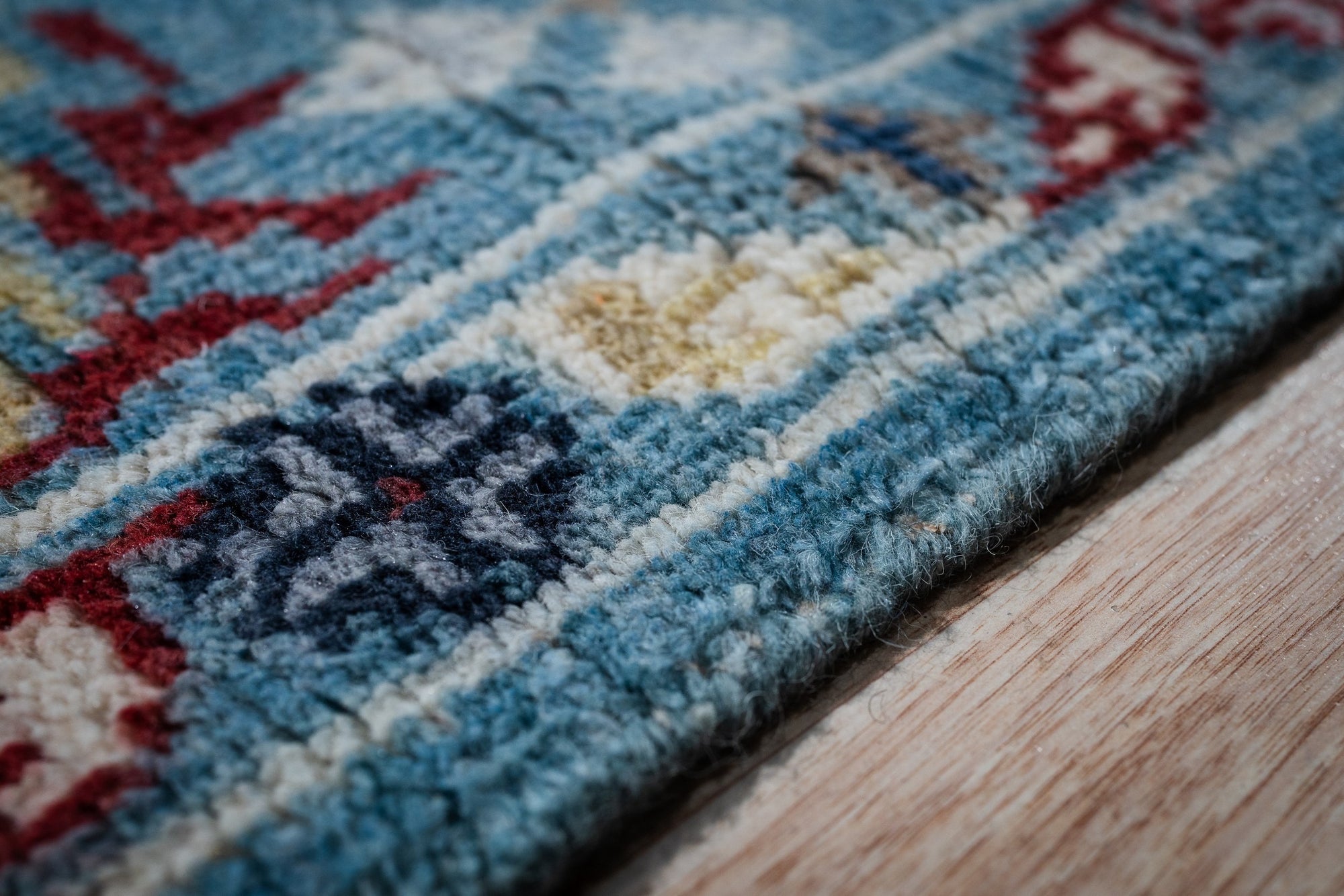 Turquoise Oushak rug border close-up