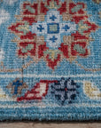 Turquoise Oushak rug border motif close-up