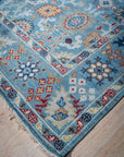 Turquoise Oushak rug corner and border detail