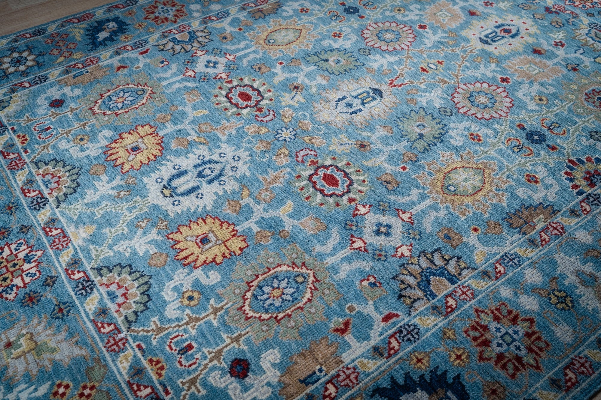 Turquoise Oushak rug allover floral field detail