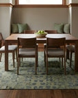 Unique Cozy Green Hand Knotted Wool Rug in a dining room