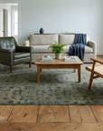 Unique Cozy Green Hand Knotted Wool Rug in a living room