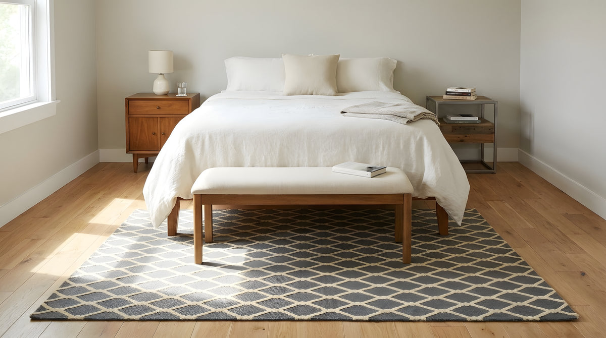 Versatile Comfortable Gray Hand Tufted Wool Rug in a bedroom