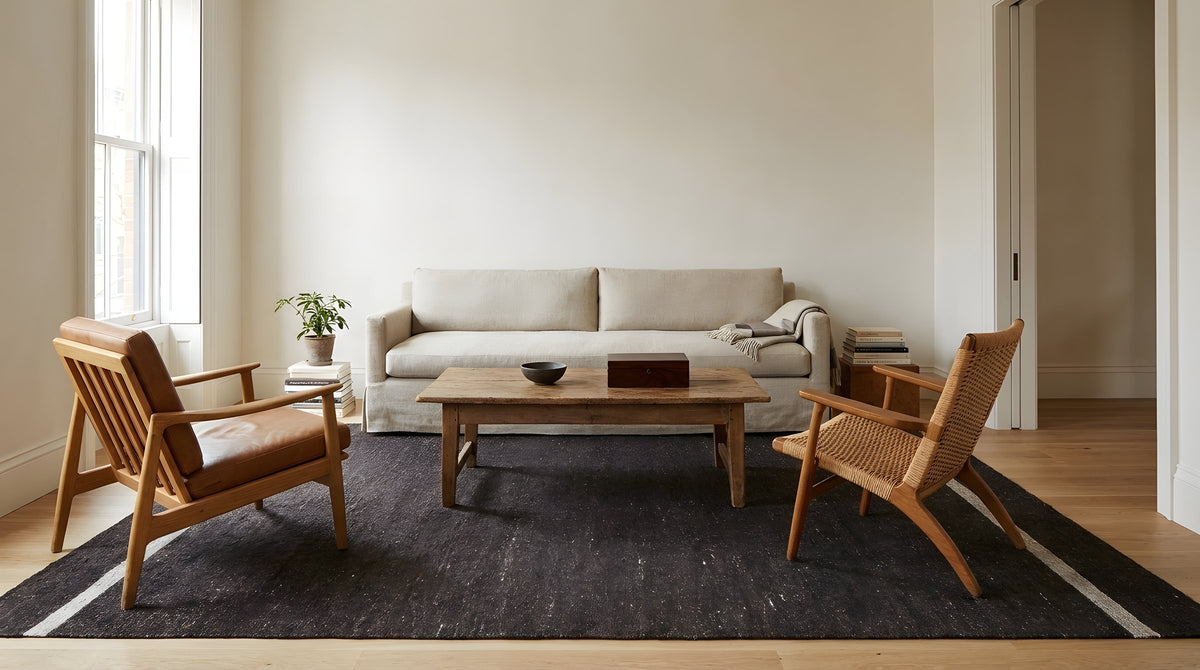 Charcoal Brown Artistic Flatweave Wool Rug in a living room