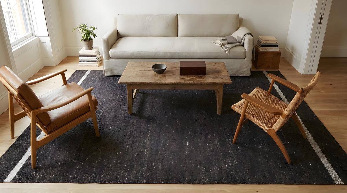 Charcoal Brown Artistic Flatweave Wool Rug in a living room